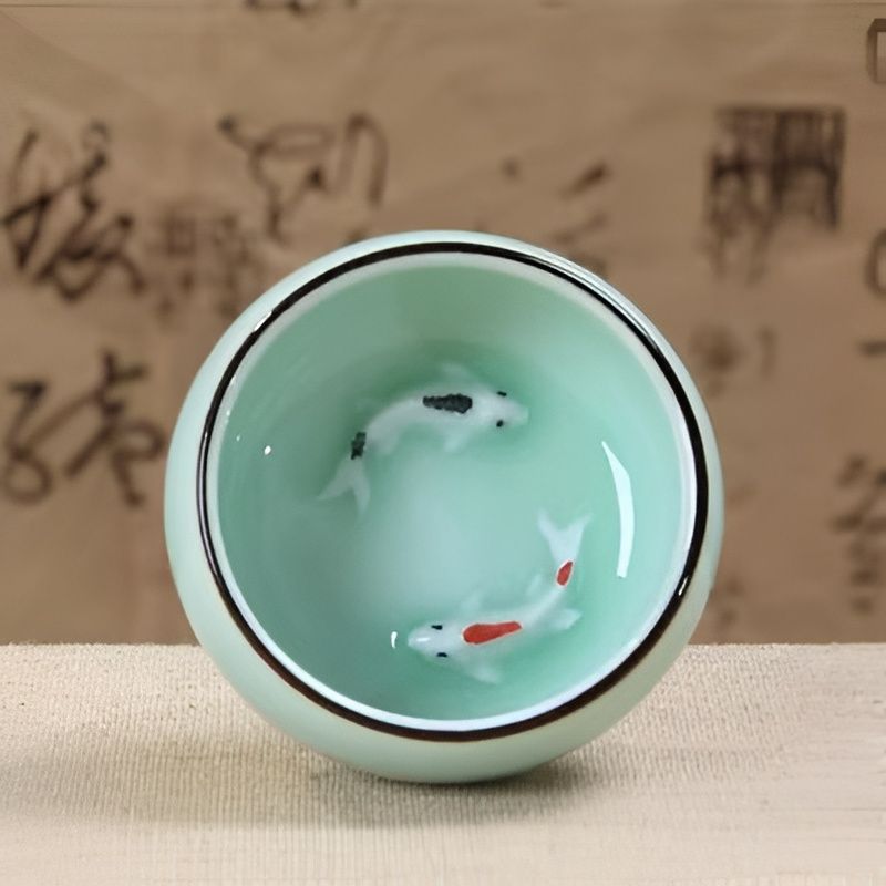 Cup with Fish Figurine