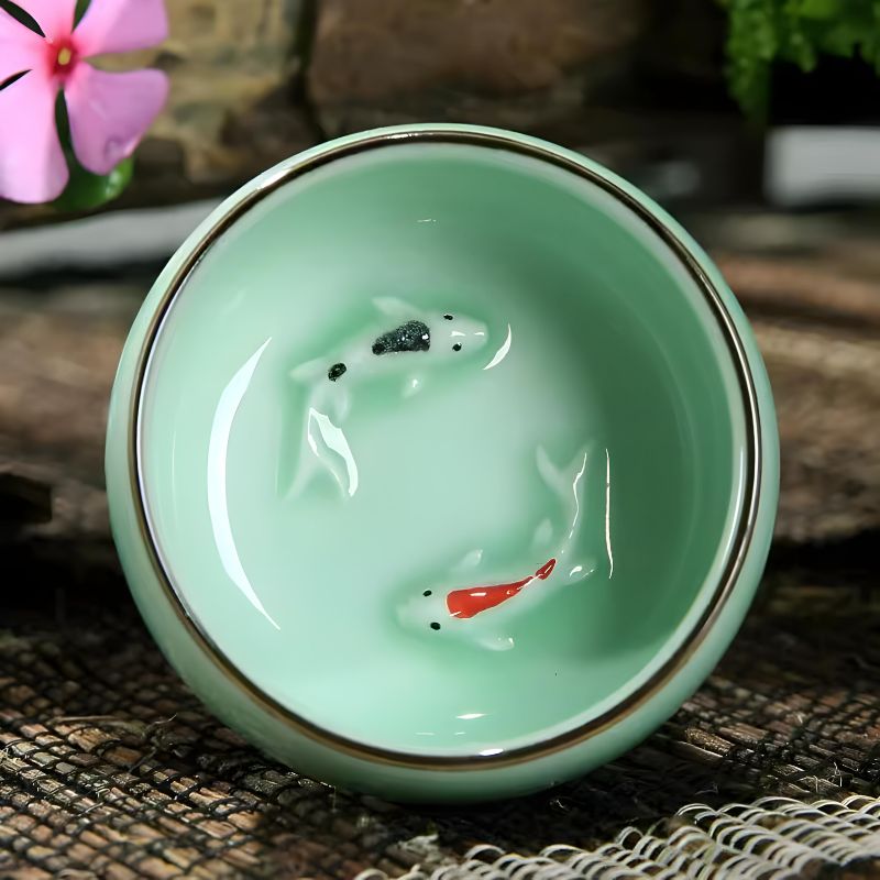 Cup with Fish Figurine