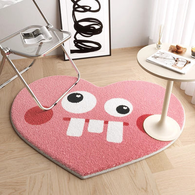 pink heart-shaped carpet (with a funny face)