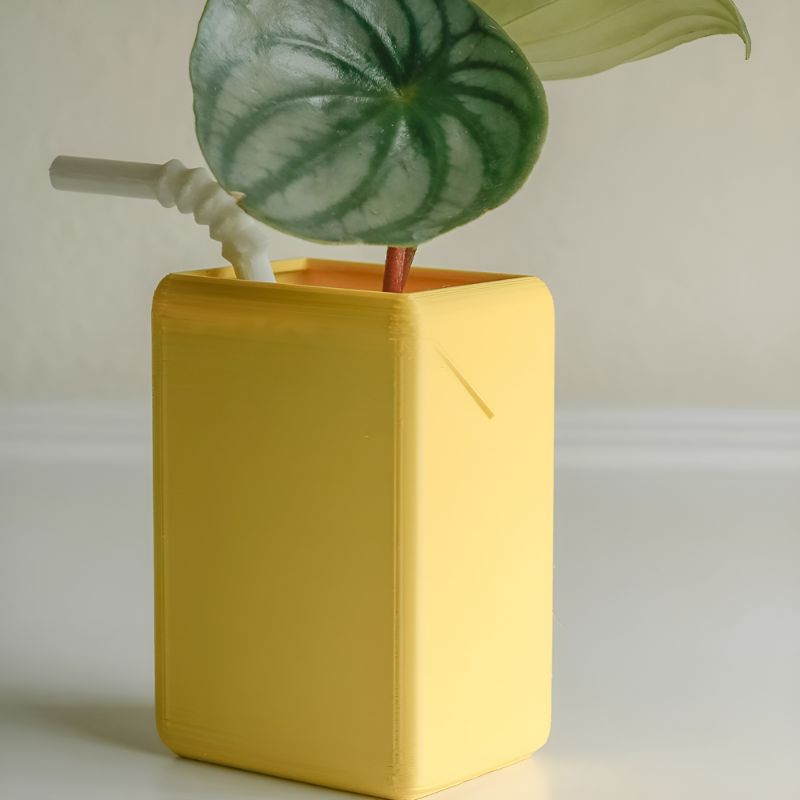 yellow juice box plant pot